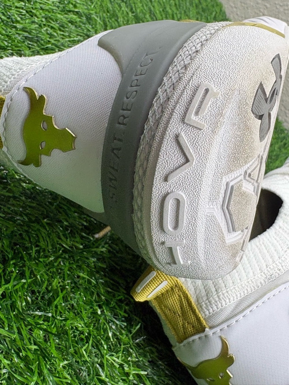 Under Armour Women’s HOVR Project Rock 4 Training Sneakers in White and Gold - Picture 11 of 12